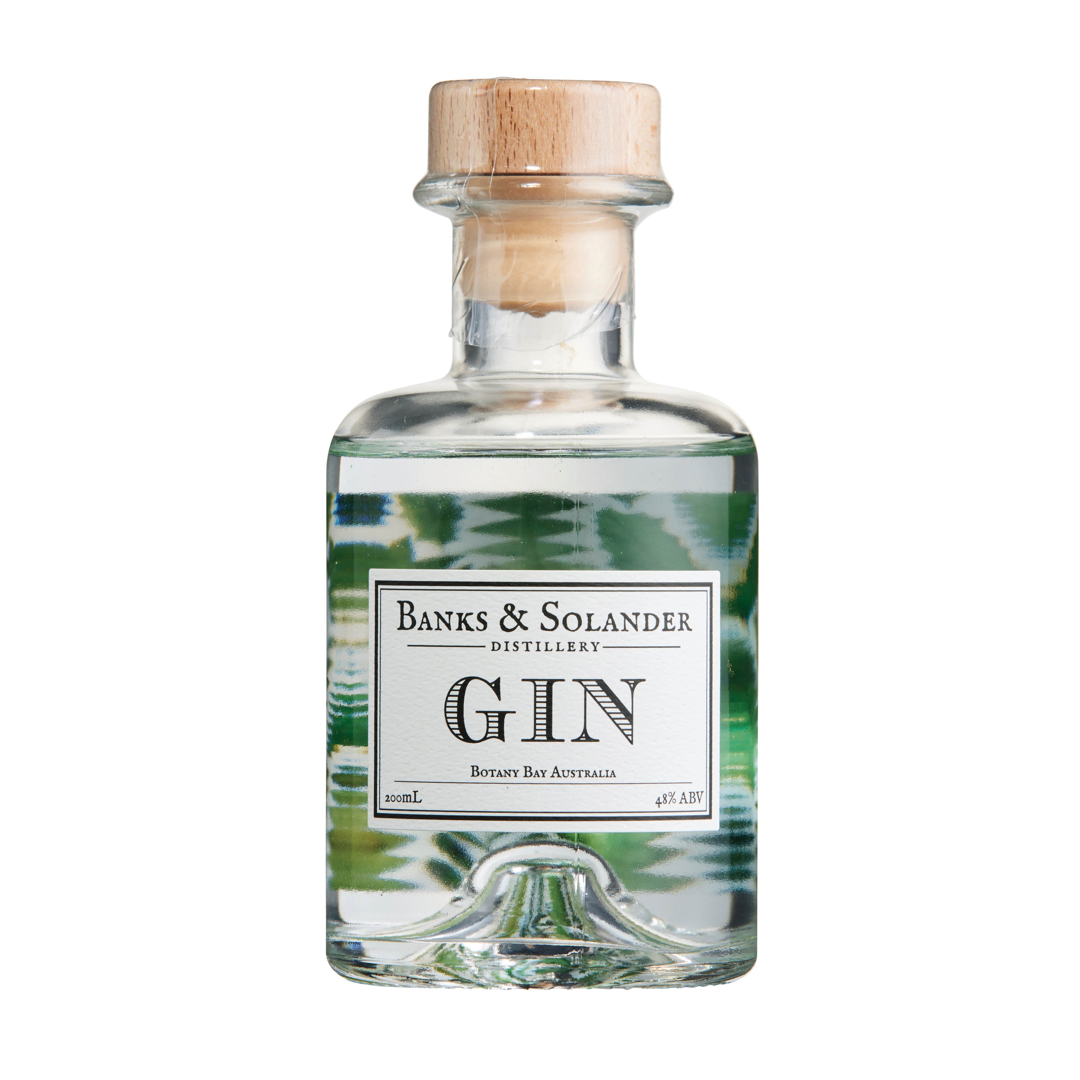 A bottle of Banks & Solander Signature Gin. The bottle is clear and shows the gin inside. The label reads "Gin" and "Botany Bay Australia." The bottle is 200ml and has an alcohol content of 40%.