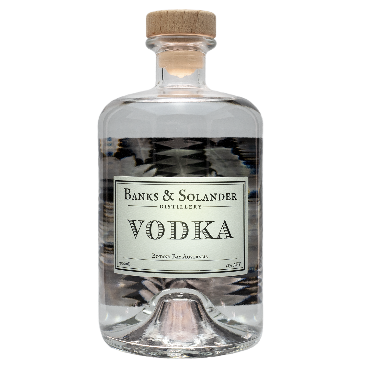 A bottle of Banks & Solander Vodka. The bottle is clear and shows the vodka inside. The label reads "Vodka" and "Botany Bay Australia." The bottle is 700ml and has an alcohol content of 38%.