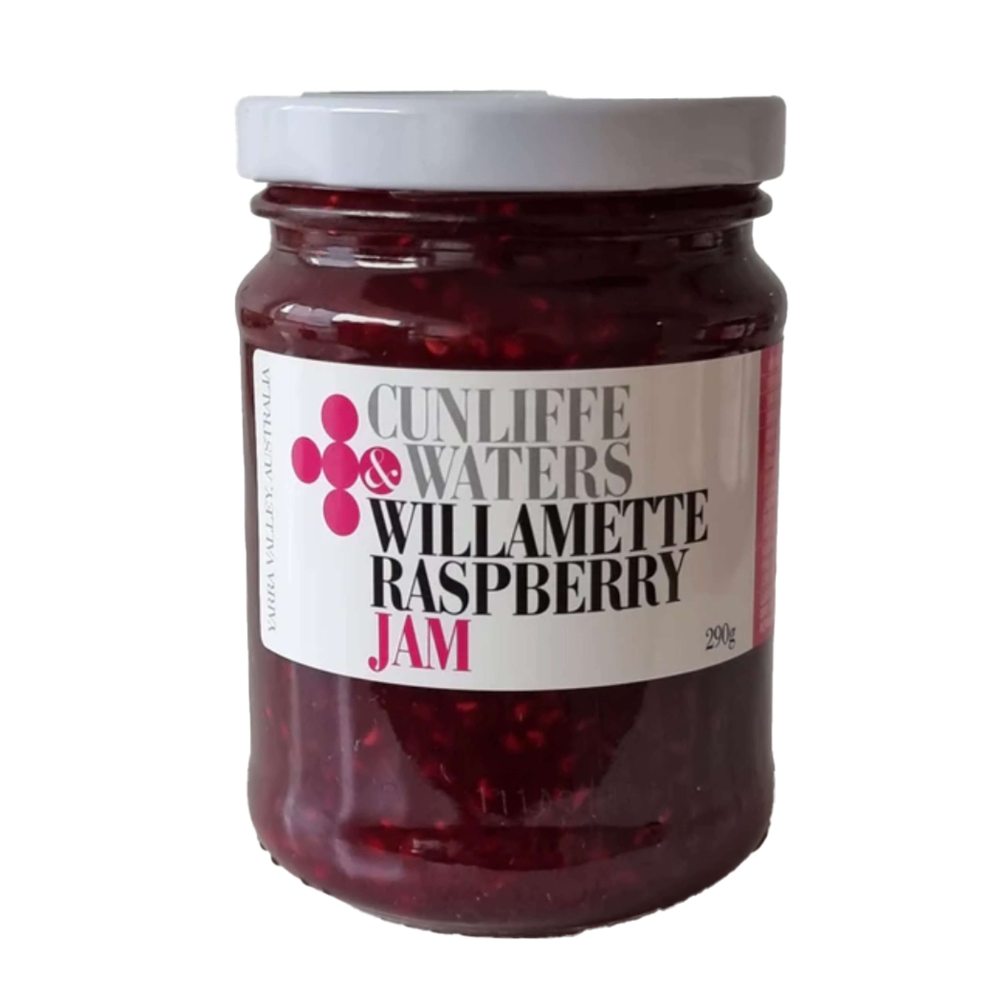 A jar of Cunliffe & Waters Willamette Raspberry Jam with a white label featuring the brand name, flavour, and weight (290g). The lid is grey. Made in Yarra Valley, Australia.