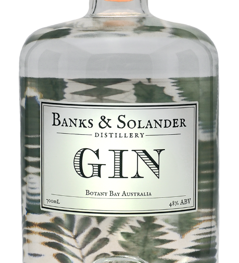 A bottle of Banks & Solander Signature Gin. The bottle is clear and shows the gin inside. The label reads "Gin" and "Botany Bay Australia." The bottle is 700ml and has an alcohol content of 40%.