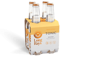 A four-pack of Long Rays Original Tonic Water bottles. The bottles are clear glass with copper-colored caps. The packaging is yellow with white and gold accents. The brand name and flavor are prominently displayed.