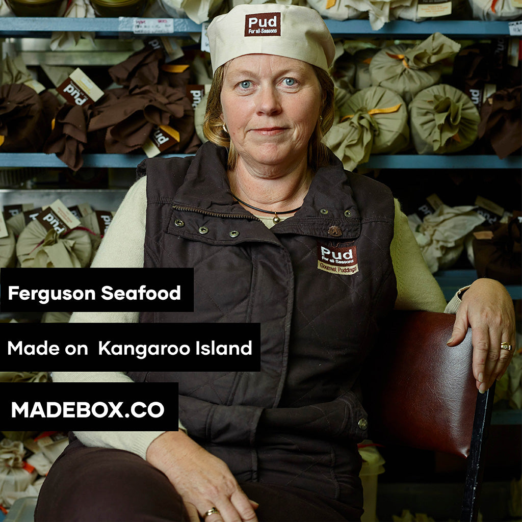 A woman with a hat sits in a chair, embodying elegance and tranquility in her posture. The text reads: Ferguson Seafood Made on Kangaroo Island